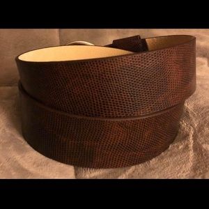 Beautiful leather belt with silver tone buckle.